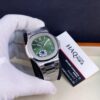 CC2BC5F6-E1D9-4EEB-B018-AF144842F3C2 Patek Philippe Nautilus Argenté Vert Hommes